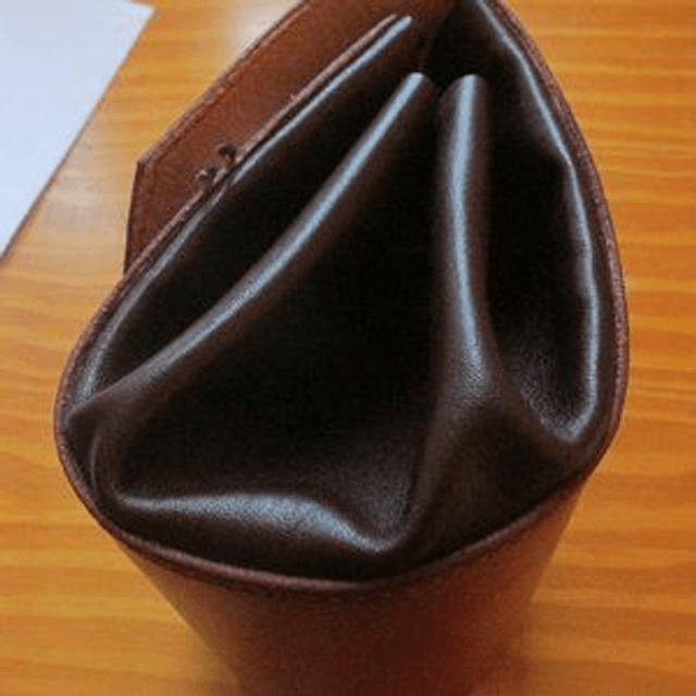 Sac bourse  en cuir à porter à la main