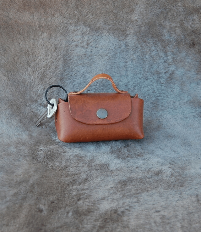 Petit sac porte clé en cuir à attacher à votre sac 